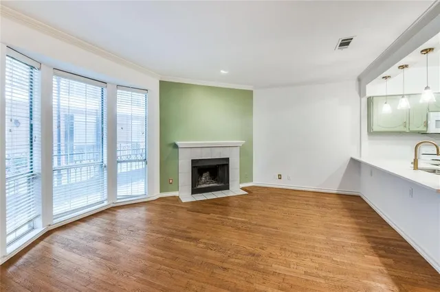 a kitchen with sink and cabinets