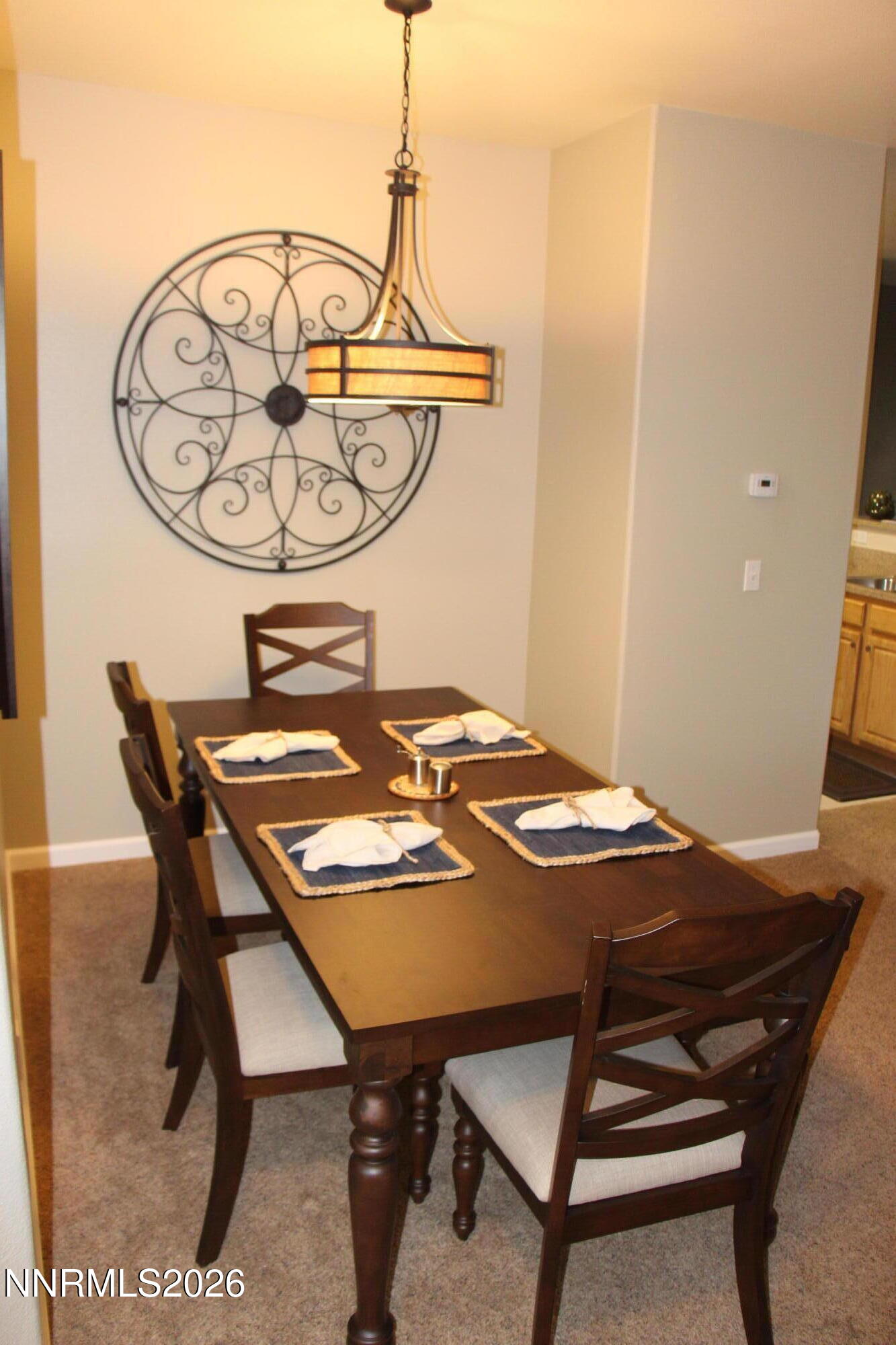 900 South Meadows Parkway, Unit 2122 Reno, NV 89521 - Photo 6 of 6 a view of a dining area with furniture