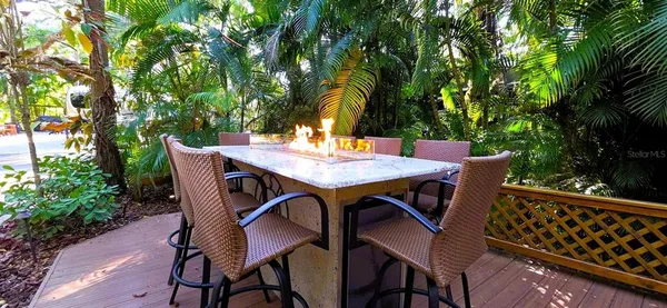 a view of an outdoor space with table and chair