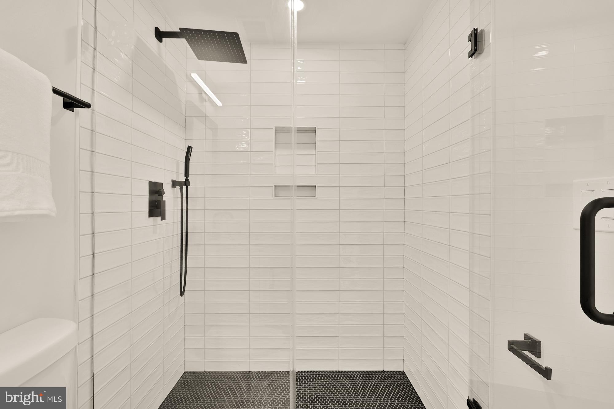 2606 41st Street Northwest, Unit 4 Washington, DC 20007 - Photo 17 of 25 a bathroom with a shower