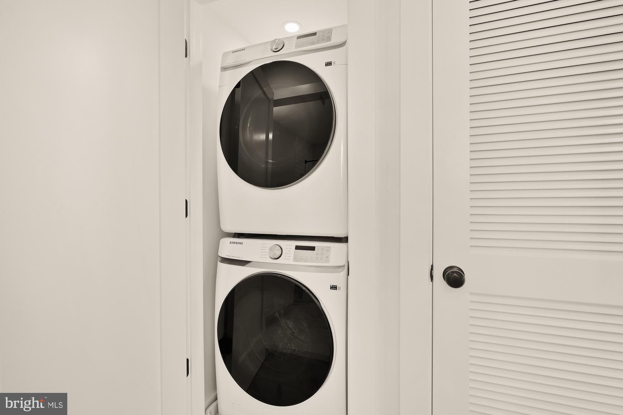 2606 41st Street Northwest, Unit 4 Washington, DC 20007 - Photo 23 of 25 a close up view of a washer and dryer