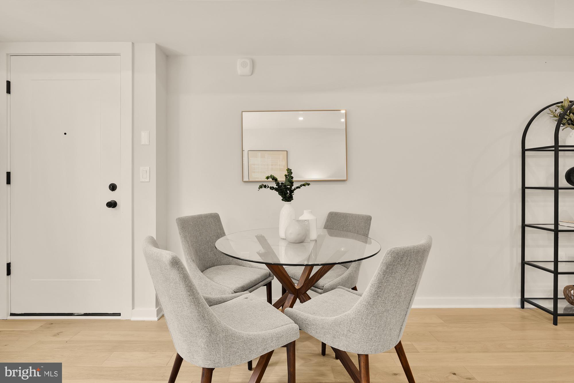 2606 41st Street Northwest, Unit 4 Washington, DC 20007 - Photo 4 of 25 a view of a dining room with furniture and wooden floor