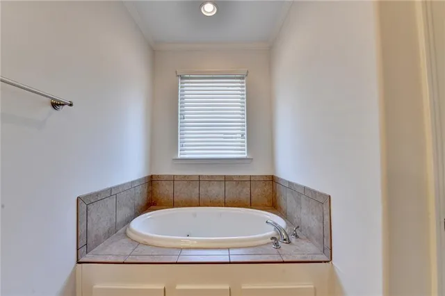 a view of storage and utility room with washer and dryer