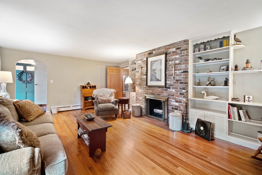 197 Hazardville Road Longmeadow, MA 01106 - Photo 12 of 37 a living room with furniture and a fireplace