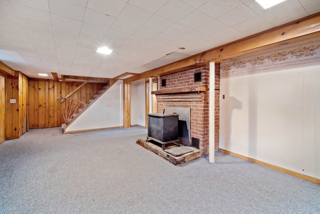 197 Hazardville Road Longmeadow, MA 01106 - Photo 31 of 37 a view of an empty room with stairs