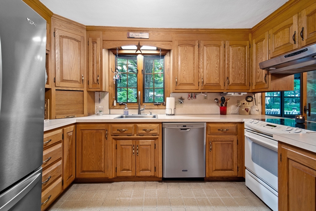 197 Hazardville Road Longmeadow, MA 01106 - Photo 4 of 37 a kitchen with sink cabinets and window