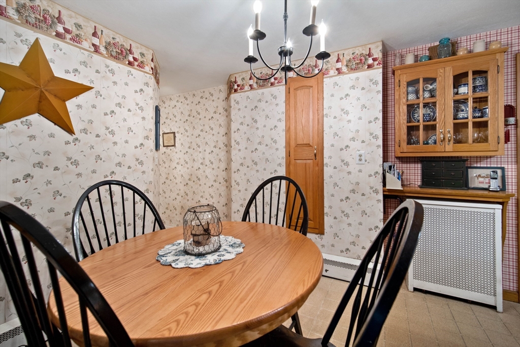 197 Hazardville Road Longmeadow, MA 01106 - Photo 7 of 37 a view of a dining room with furniture and wooden floor