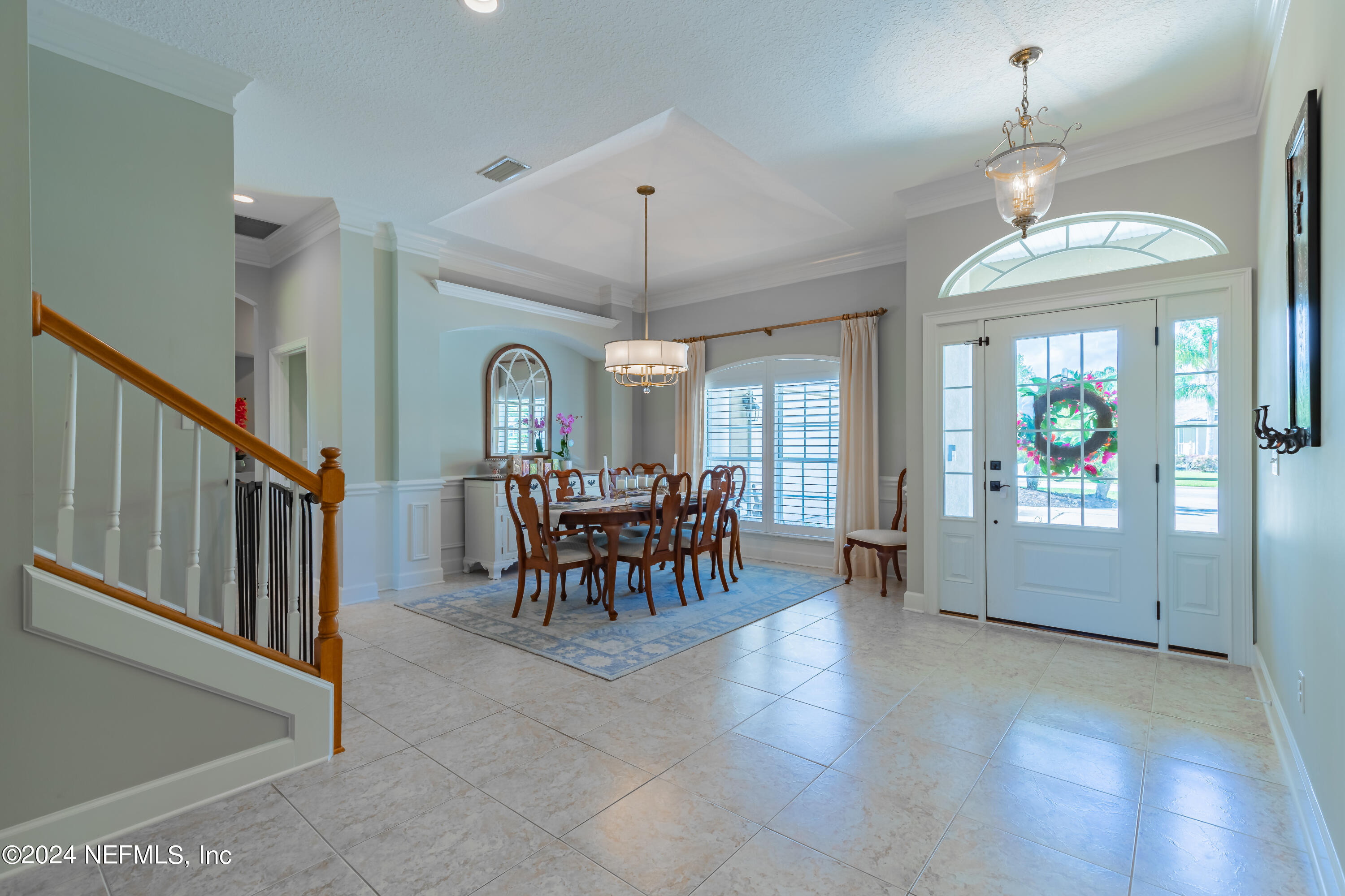 2032 Rivergate Drive Fleming Island, FL 32003 - Photo 5 of 120 a view of a dining room with furniture window and wooden floor
