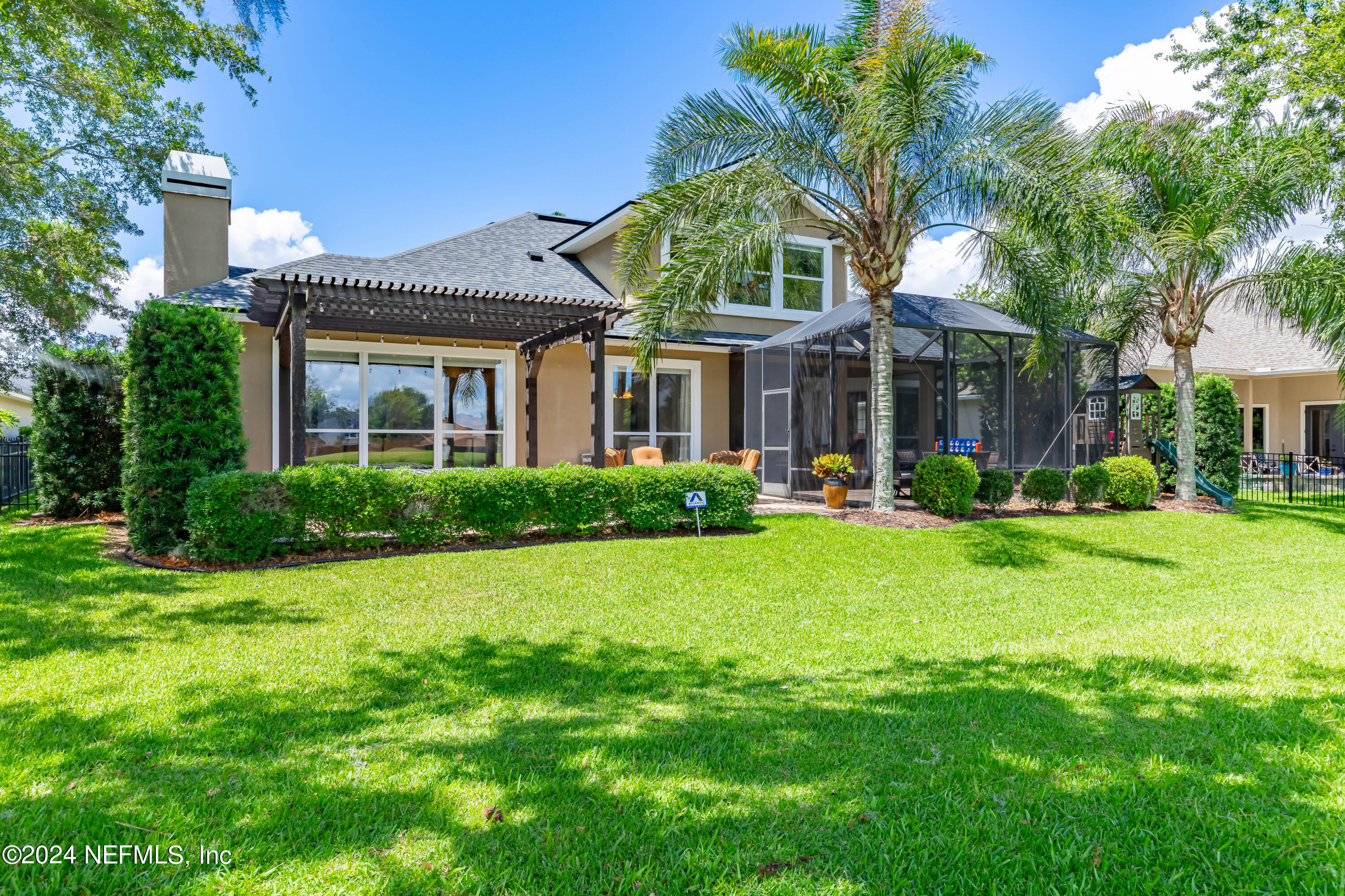 2032 Rivergate Drive Fleming Island, FL 32003 - Photo 53 of 120 a front view of a house with a yard