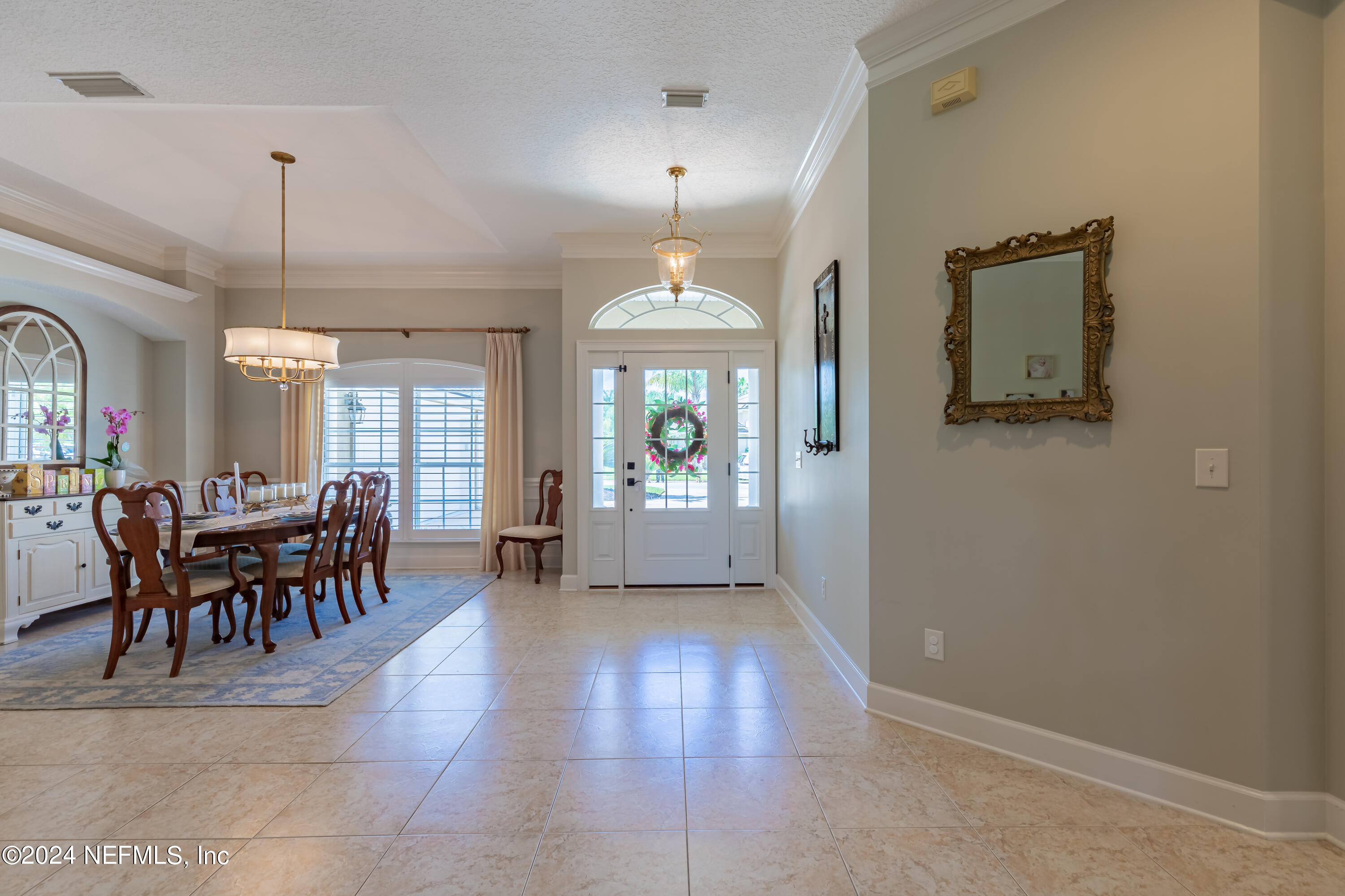 2032 Rivergate Drive Fleming Island, FL 32003 - Photo 6 of 120 a view of a livingroom with furniture window and wooden floor