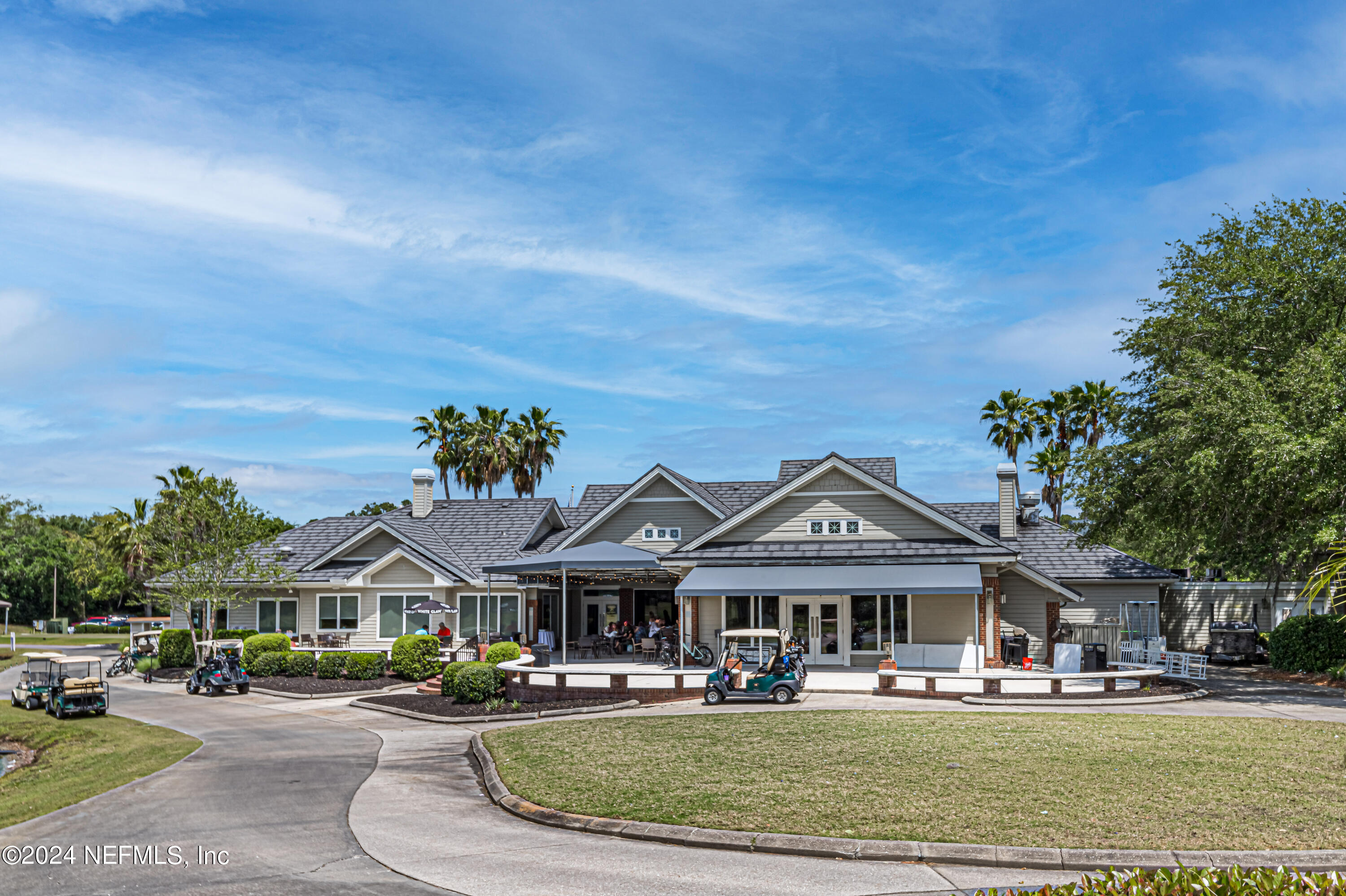 2032 Rivergate Drive Fleming Island, FL 32003 - Photo 65 of 120 a front view of a house with a yard