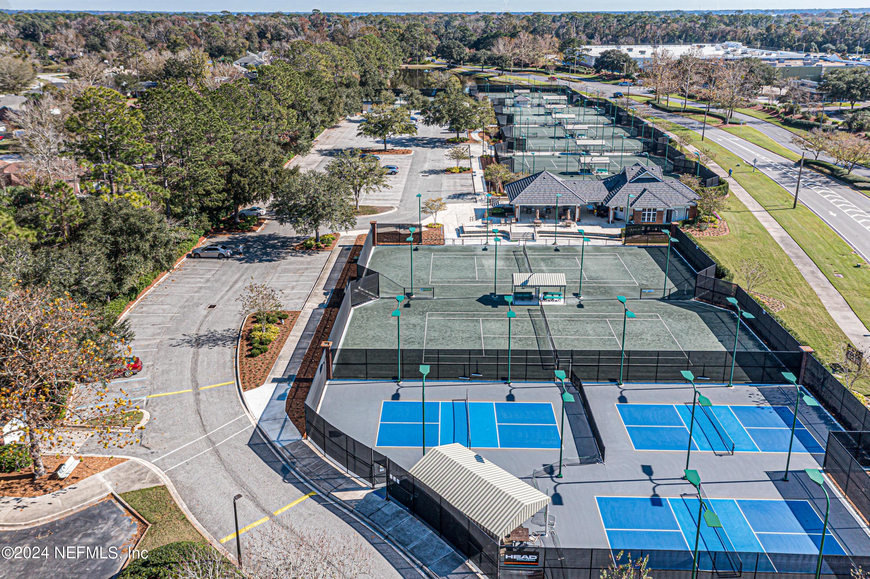 2032 Rivergate Drive Fleming Island, FL 32003 - Photo 98 of 120 an aerial view of a house with a swimming pool