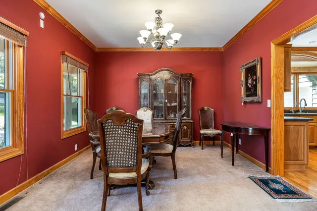 a view of room with window and wooden floor