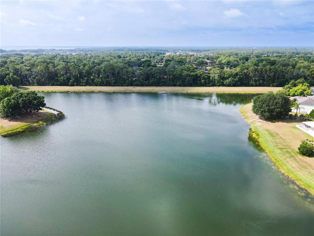 3194 Windmill Point Boulevard Kissimmee, FL 34746 - Photo 32 of 32 a view of a lake view with a mountain view