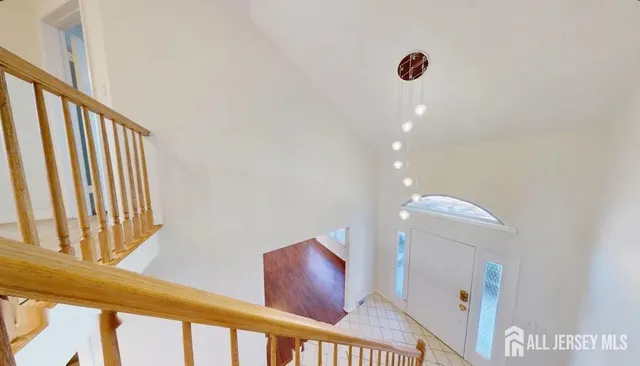 a view of a hallway with windows