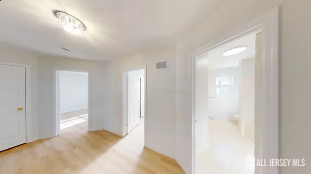 a view of a bedroom with closet
