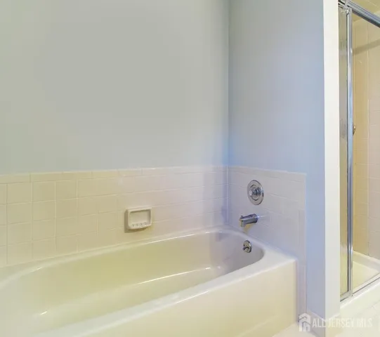 a bathroom with a bathtub
