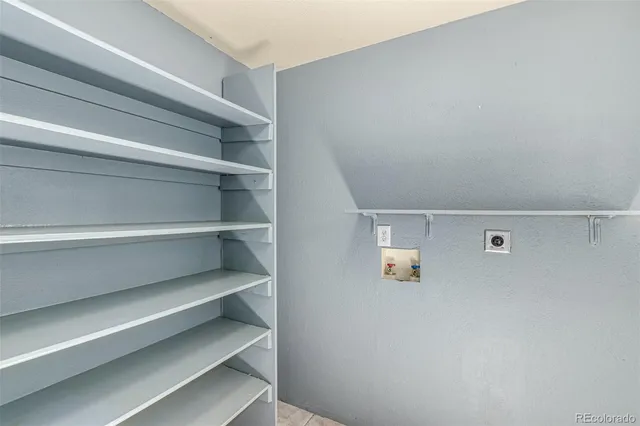 a bathroom with a double vanity sink and mirror with shower