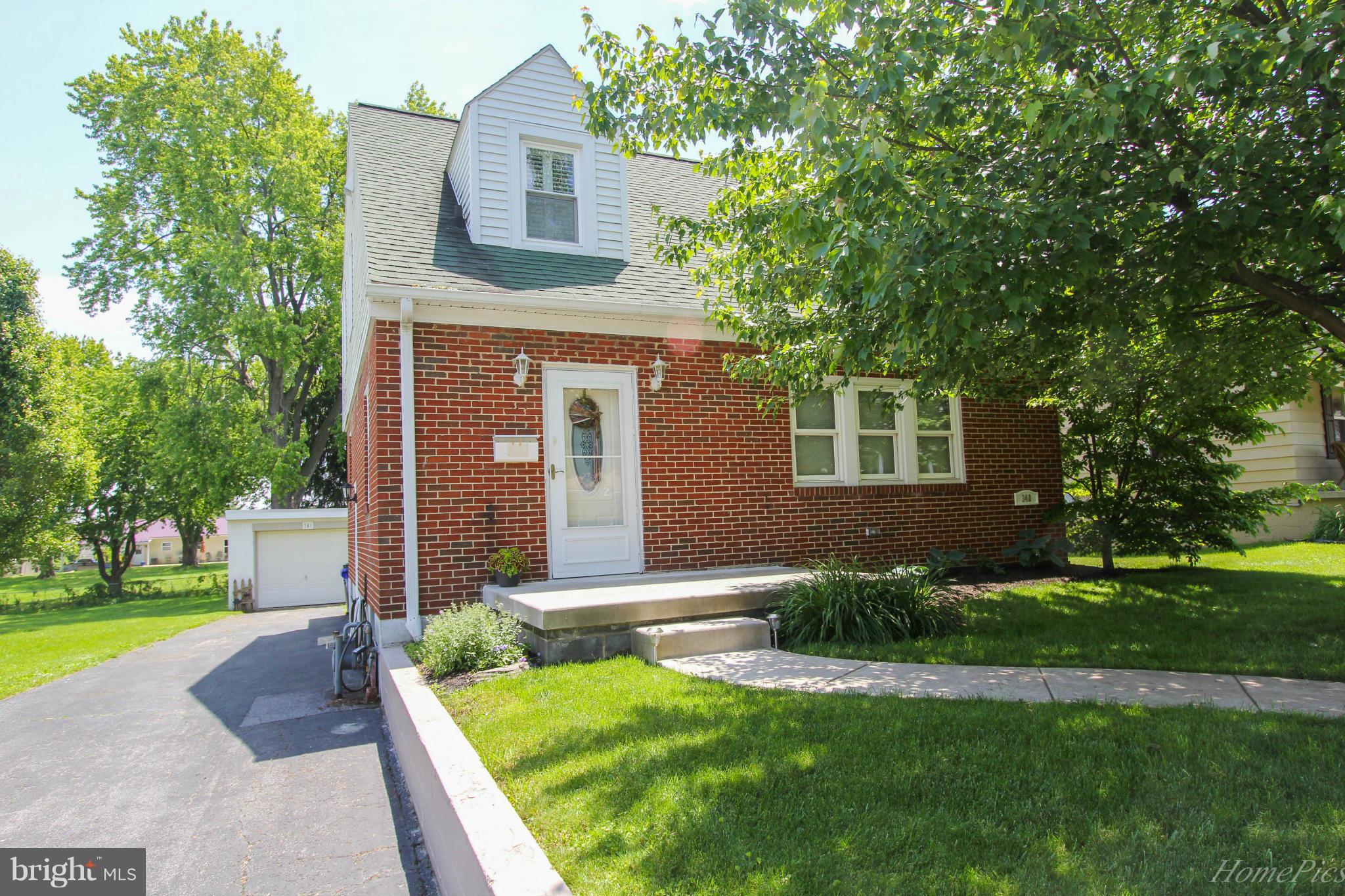 340 Devonshire Road Hagerstown, MD 21740 - Photo 1 of 26 a front view of a house with garden