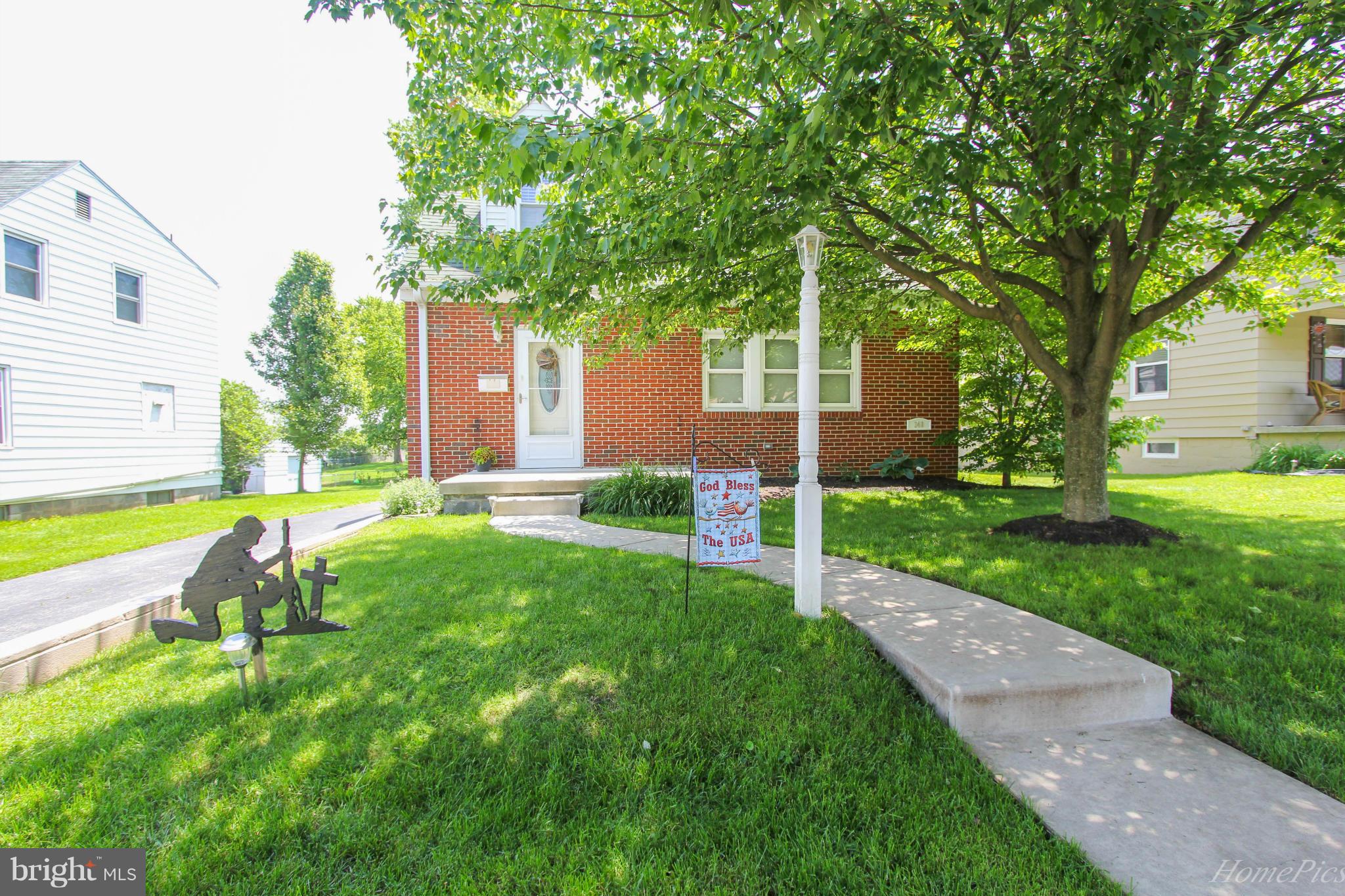 340 Devonshire Road Hagerstown, MD 21740 - Photo 2 of 26 a view of a house with a backyard and a tree