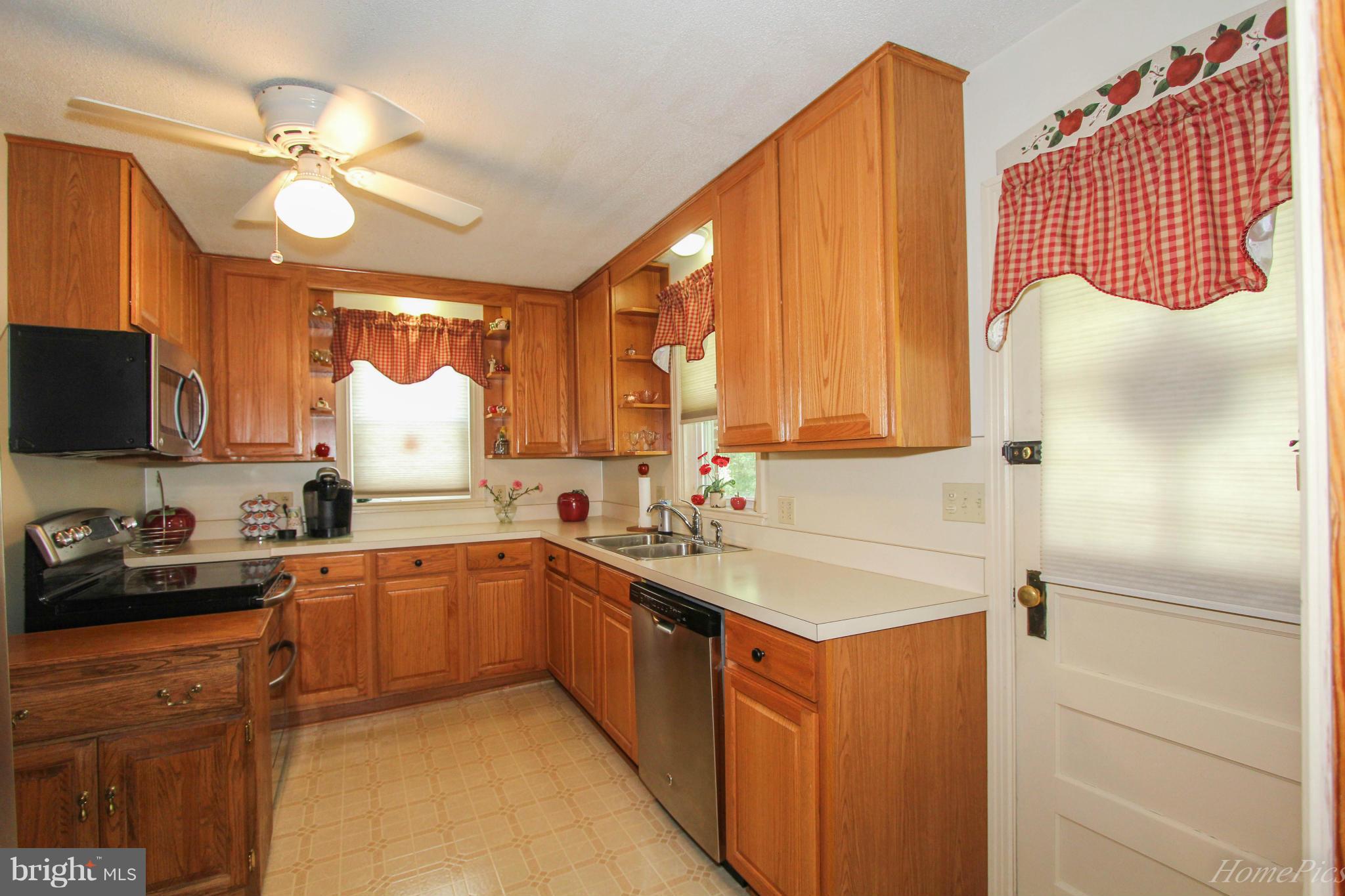 340 Devonshire Road Hagerstown, MD 21740 - Photo 12 of 26 a kitchen with a sink cabinets and window