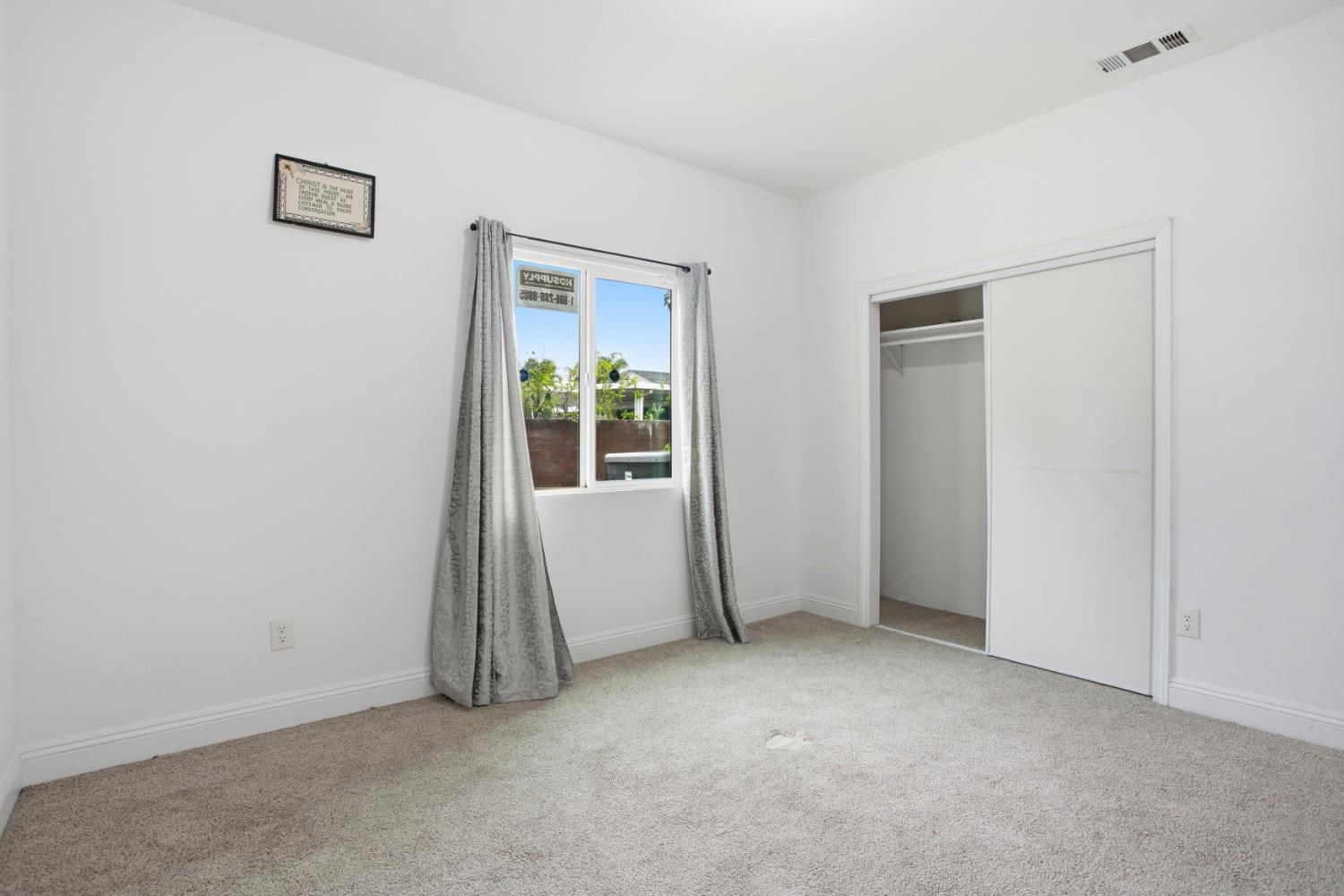 5680 Power Inn Road Sacramento, CA 95824 - Photo 22 of 48 a view of an empty room with a window