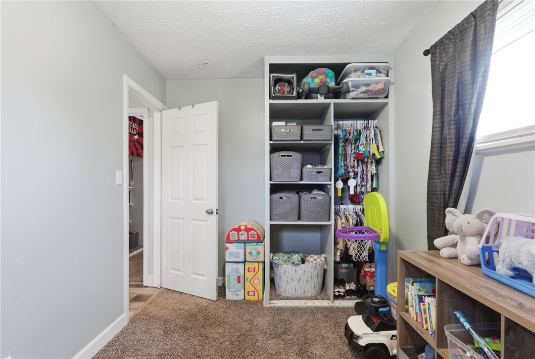 441 Townsend Place Riverside, OH 45431 - Photo 22 of 34 This cozy bedroom features a practical closet, offering ample storage within a comfortable living space.