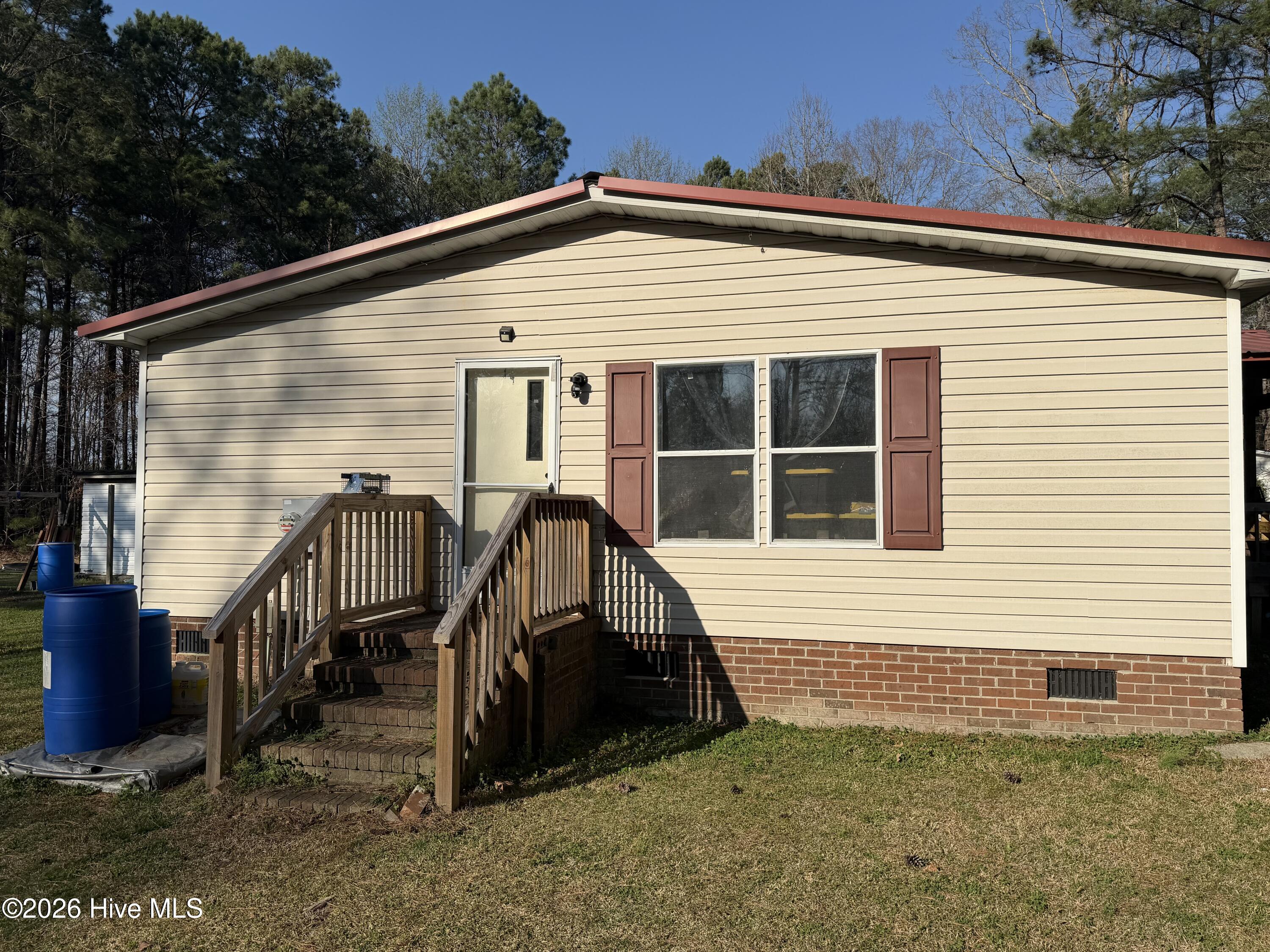 67 Oakham Place Pinetops, NC 27864 - Photo 2 of 19 Side entrance to laundry room
