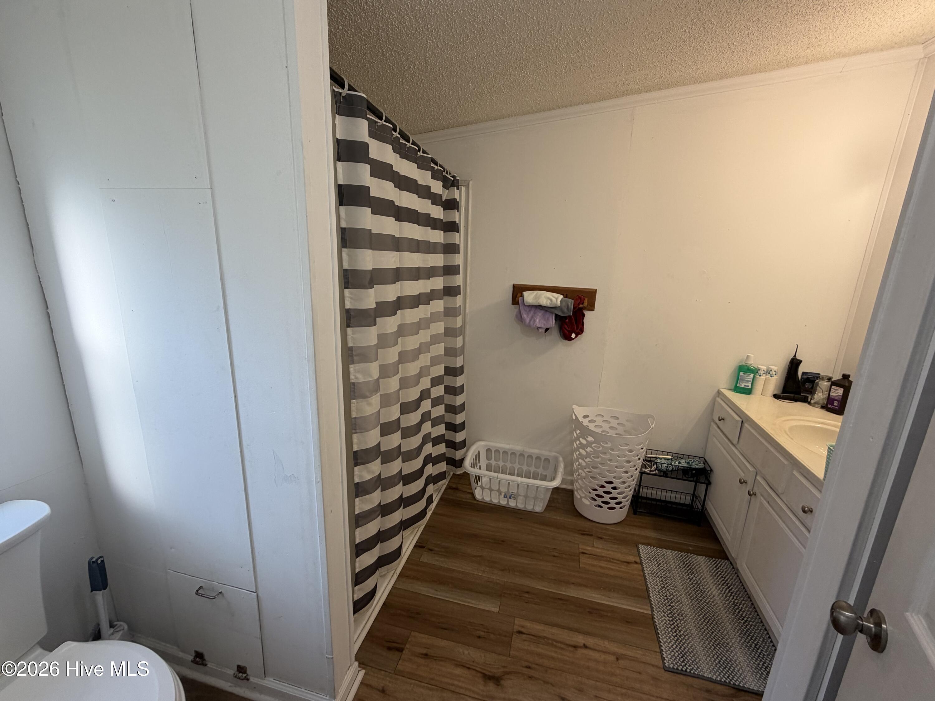 67 Oakham Place Pinetops, NC 27864 - Photo 6 of 19 1st full bathroom with shower stall