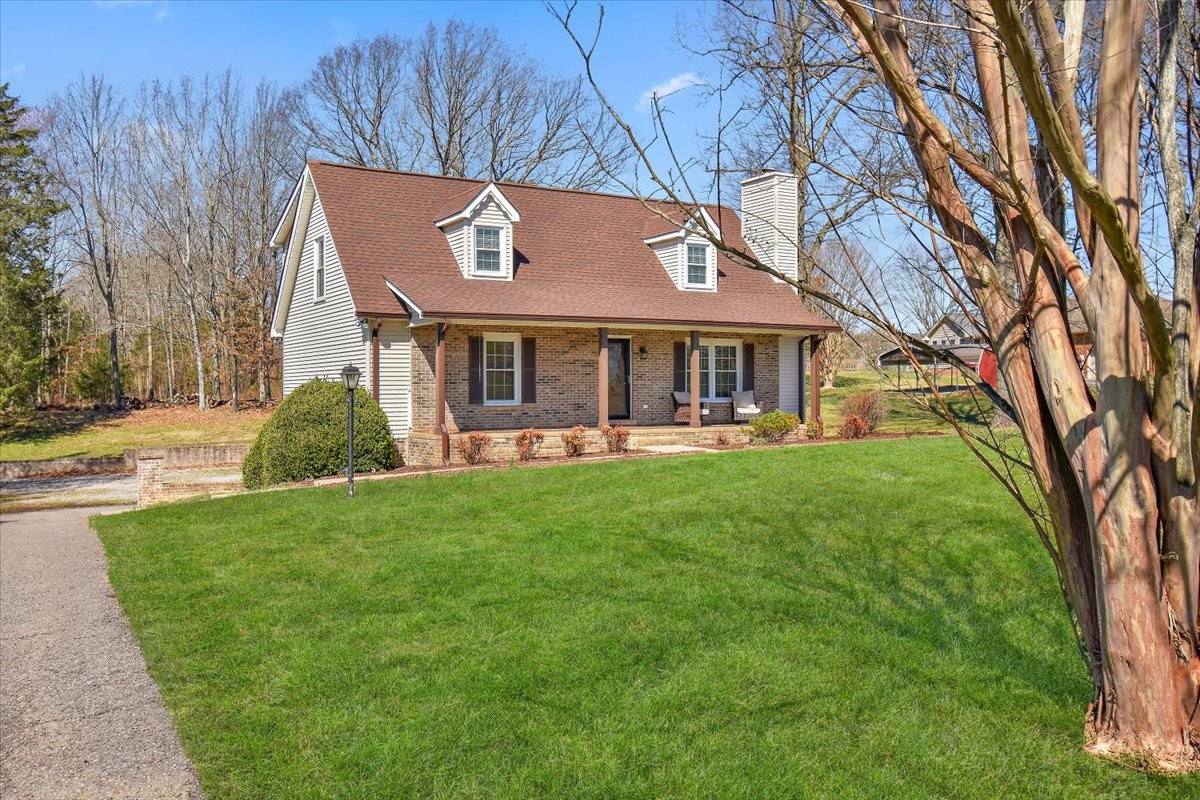 2609 Derby Run Road Springfield, TN 37172 - Photo 1 of 48 a front view of a house with garden