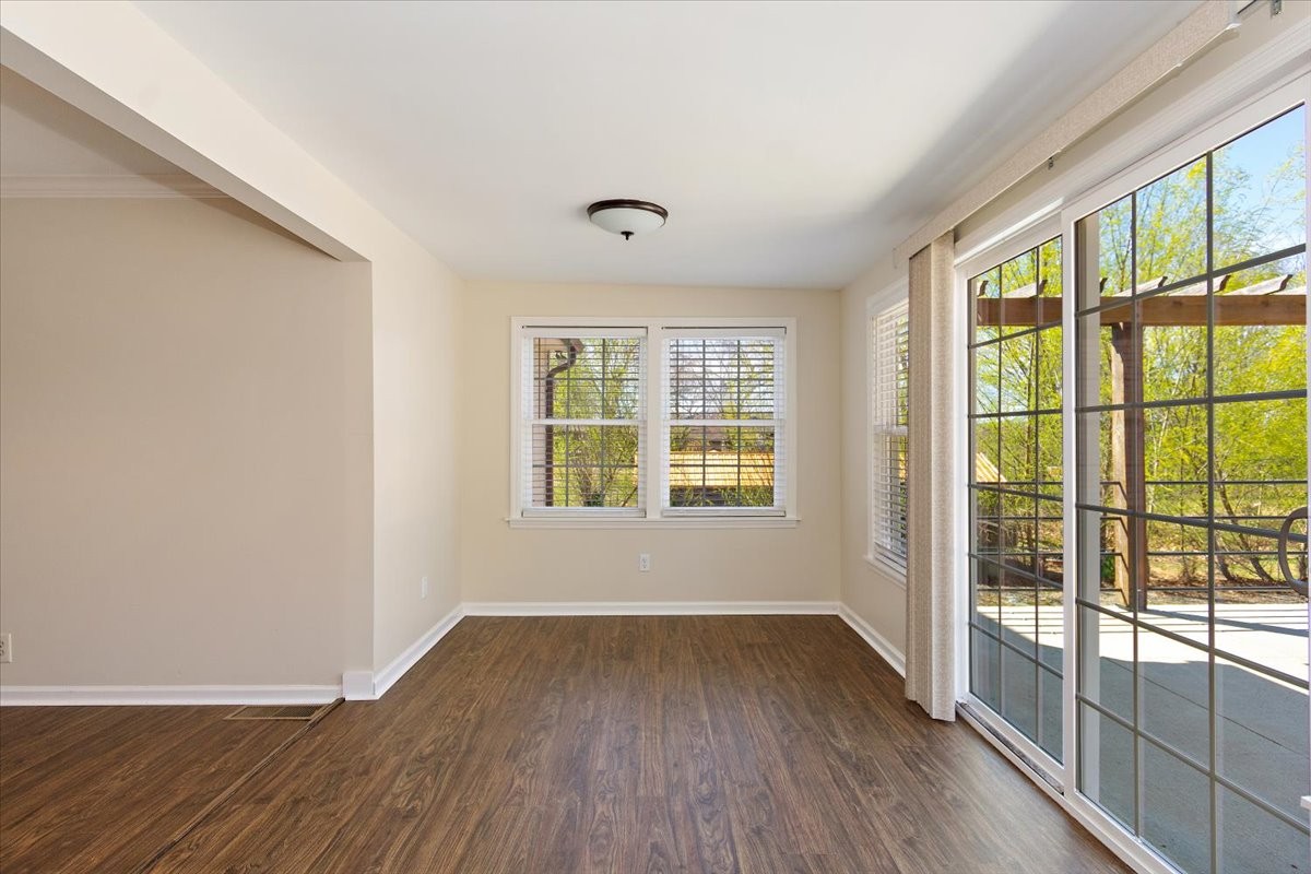 2609 Derby Run Road Springfield, TN 37172 - Photo 13 of 48 an empty room with wooden floor and windows