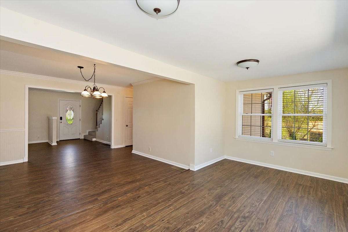 2609 Derby Run Road Springfield, TN 37172 - Photo 14 of 48 a view of an empty room with window and wooden floor