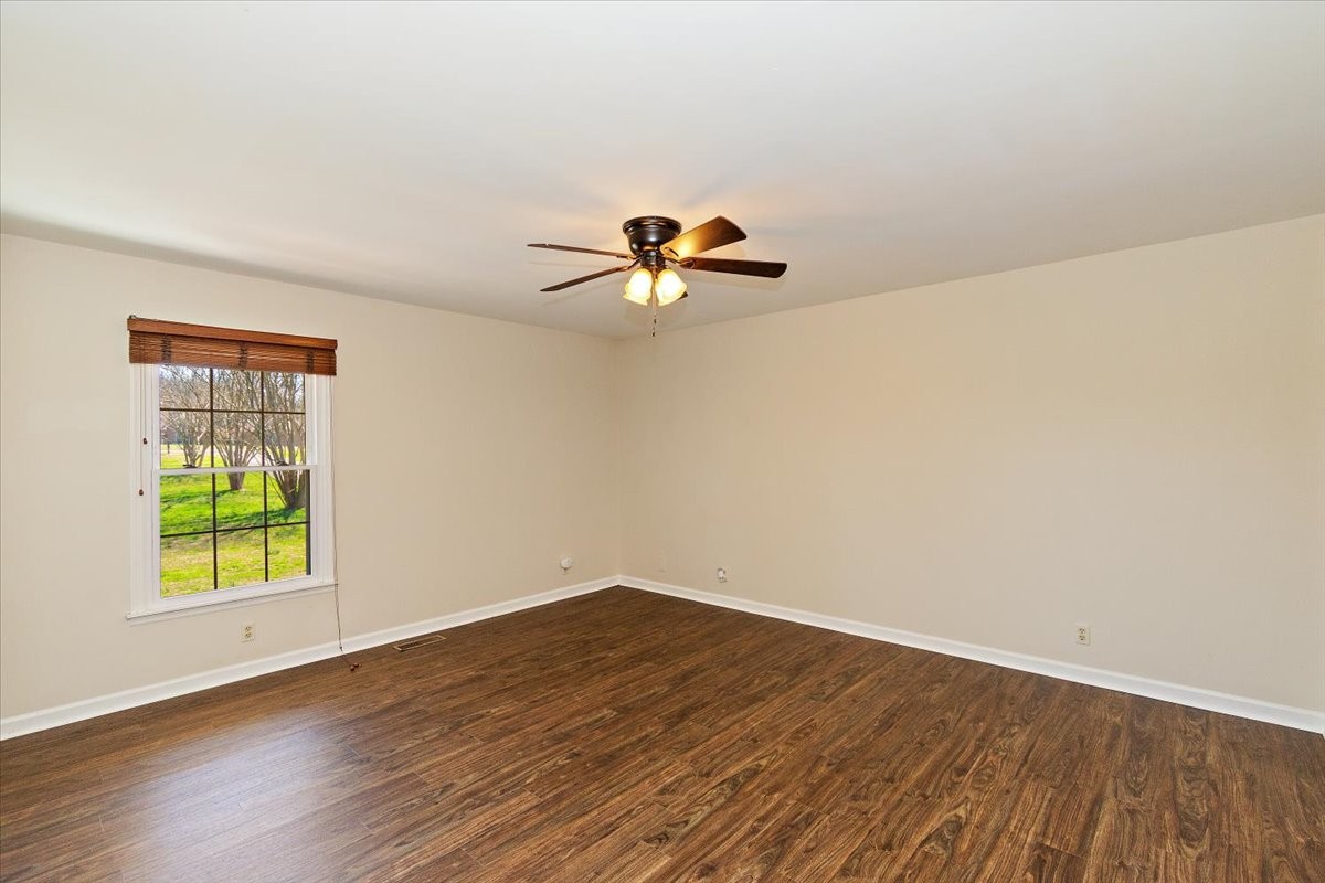2609 Derby Run Road Springfield, TN 37172 - Photo 16 of 48 wooden floor in an empty room with a window