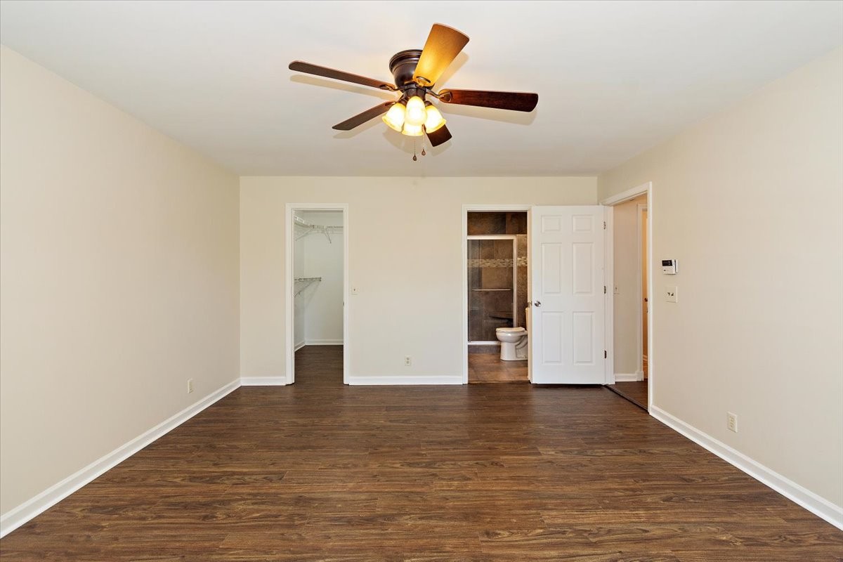 2609 Derby Run Road Springfield, TN 37172 - Photo 18 of 48 a view of an empty room with window and wooden floor