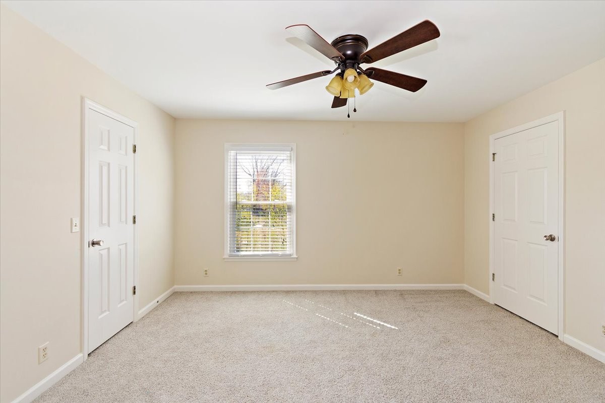 2609 Derby Run Road Springfield, TN 37172 - Photo 23 of 48 a view of a livingroom with a ceiling fan & windows