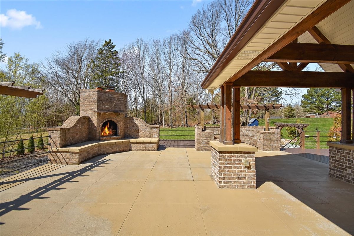 2609 Derby Run Road Springfield, TN 37172 - Photo 31 of 48 a view of a chair and tables in the patio with a small garden