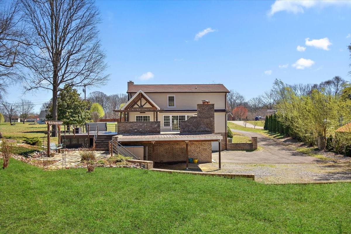 2609 Derby Run Road Springfield, TN 37172 - Photo 35 of 48 a view of a house with swimming pool and a yard