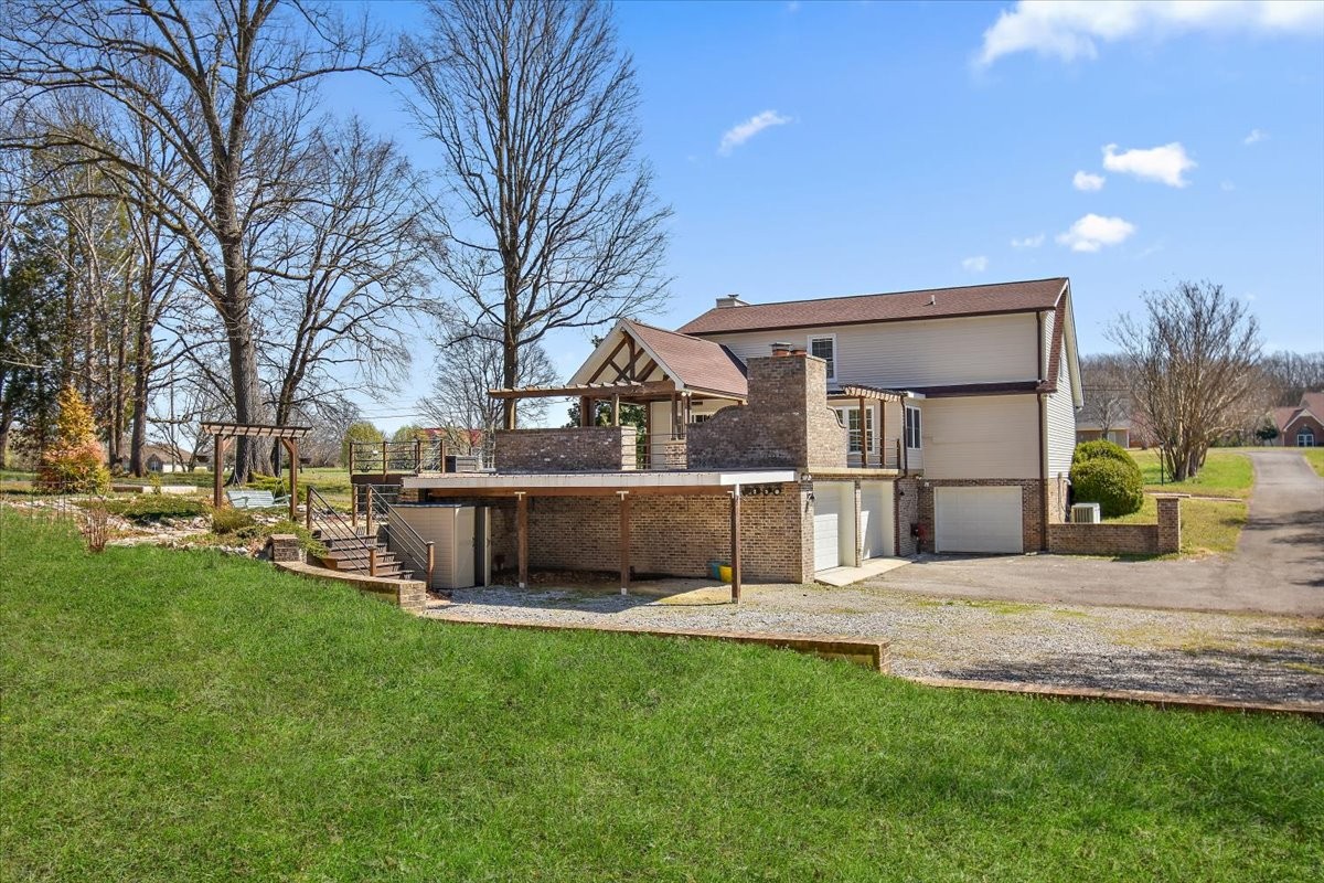 2609 Derby Run Road Springfield, TN 37172 - Photo 36 of 48 a view of a house with a yard