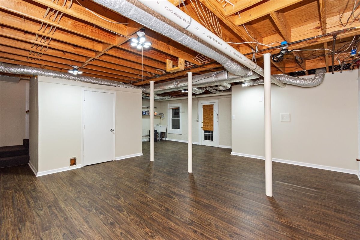 2609 Derby Run Road Springfield, TN 37172 - Photo 38 of 48 an empty room with wooden floor and windows