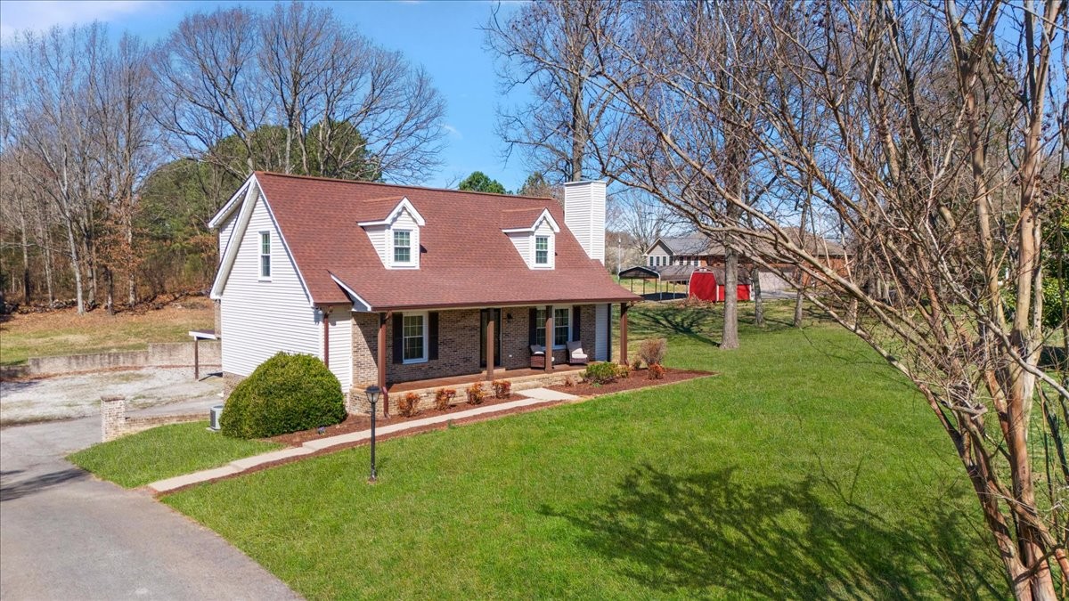 2609 Derby Run Road Springfield, TN 37172 - Photo 44 of 48 a view of a house with a yard porch and sitting area
