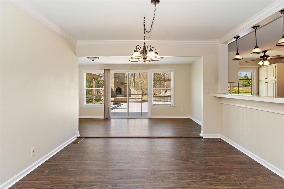 2609 Derby Run Road Springfield, TN 37172 - Photo 6 of 48 an empty room with wooden floor and windows