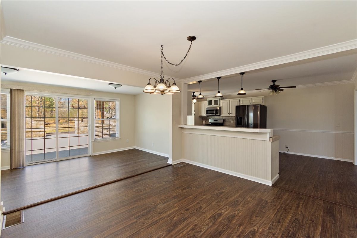 2609 Derby Run Road Springfield, TN 37172 - Photo 7 of 48 a view of a room with wooden floor and chandelier
