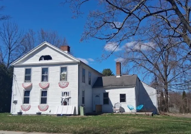 a front view of house with a yard