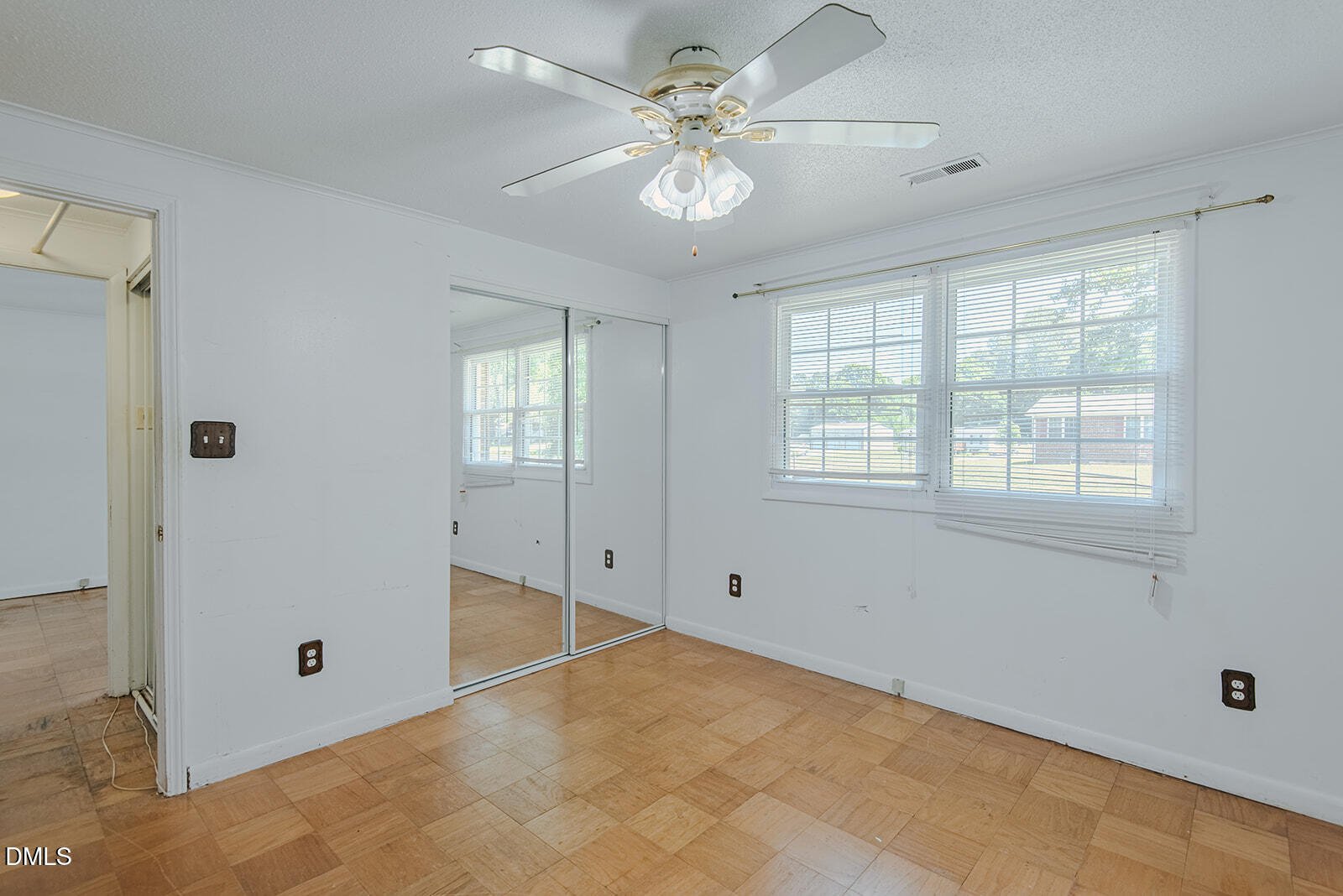 1302 Blacksmith Road Efland, NC 27243 - Photo 22 of 46 a view of an empty room with window chandelier fan