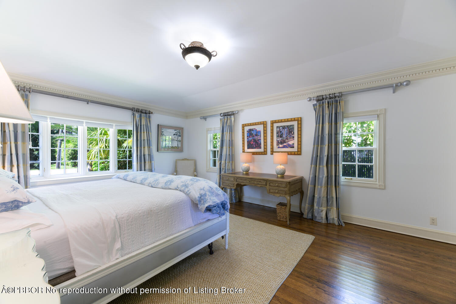 201 Pendleton Avenue Palm Beach, FL 33480 - Photo 13 of 22 a bedroom with a large bed and a window