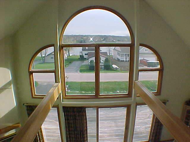 879 Breckenboro Road Lake Summerset, IL 61019 - Photo 3 of 9 a view of a room with a large window and wooden floors