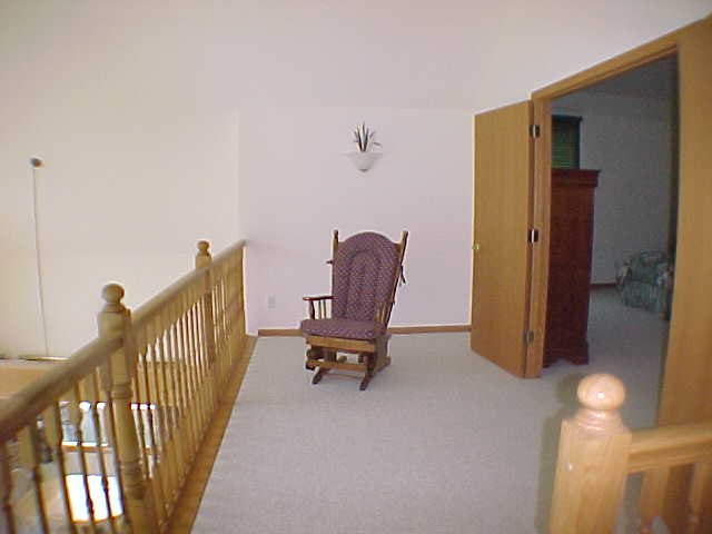 879 Breckenboro Road Lake Summerset, IL 61019 - Photo 6 of 9 a view of a workspace with furniture and a gate