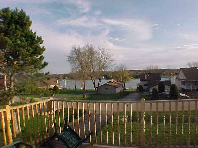 879 Breckenboro Road Lake Summerset, IL 61019 - Photo 8 of 9 a view of a street from a balcony