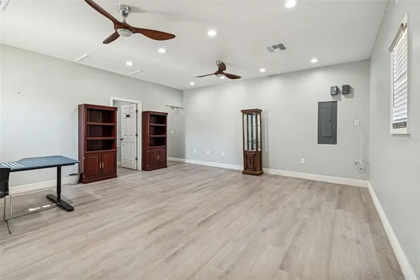 a kitchen with granite countertop a sink and cabinets