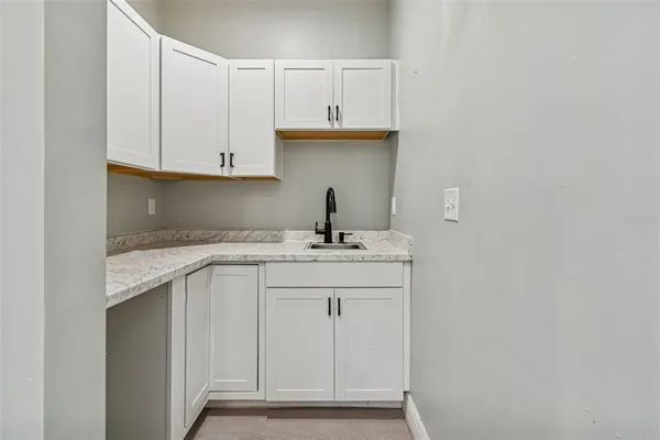 a bathroom with a toilet and a sink